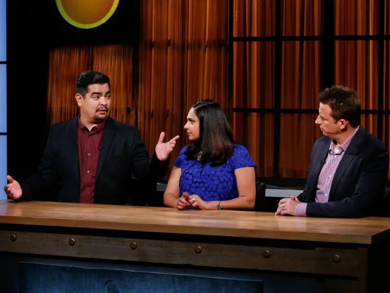 From left, judges Aaron Sanchez, Maneet Chauhan and Marc Murphy deliberate after the appetizer round tasting, as seen on Food Network's Chopped, Season 28.
