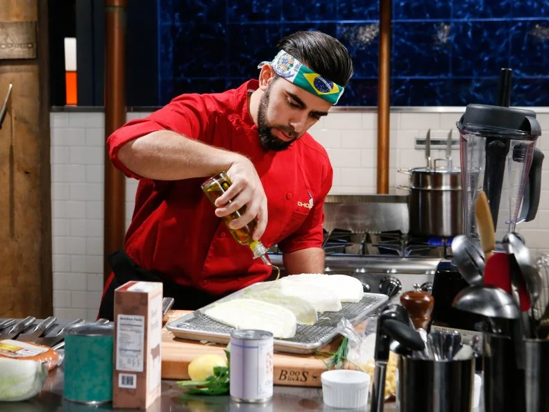 Chef Thiago Silva cooks with smoked sausage, cavatappi, Napa cabbage and frozen yogurt during the appetizer round, as seen on Food Network's Chopped, Season 28.
