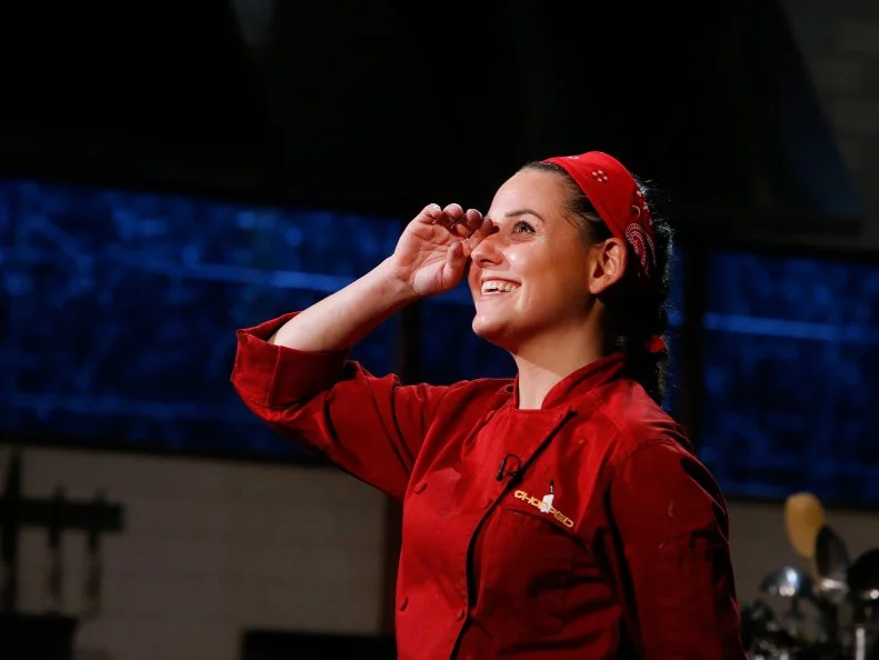 Chef Deborah Caplan reacts after winning and advancing to the grand finale, as seen on Food Network's Chopped, Season 28.