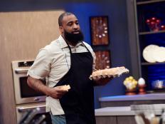 Finalist Yaku Moton-Spruill preparing his dish, 'Chili Cheese Ya Sushi Roll' Chili Cheese Dog in Asian Panko with South Meets Asian Slaw for the Mash Up Star Challenge theme, Chili Cheese Hot Dog and Sushi, as seen on Food Network Star, Season 12.