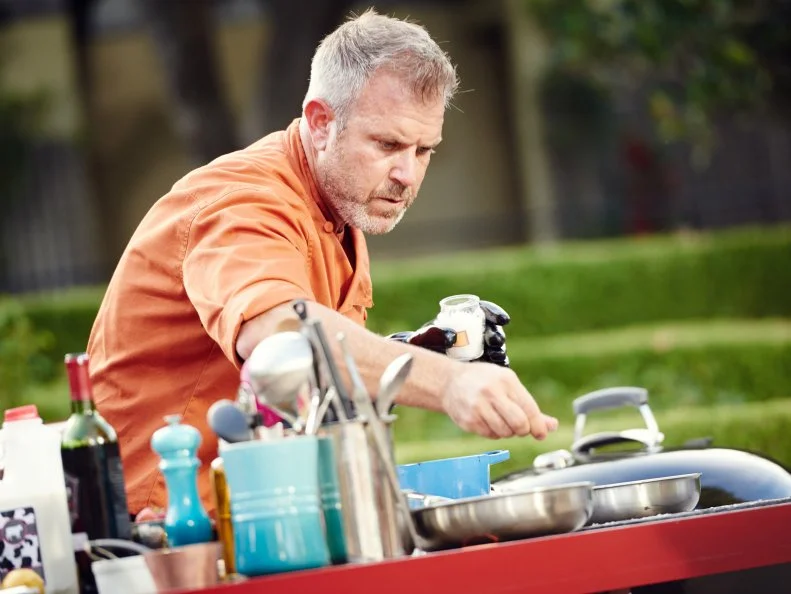 Chef Chad Rosenthal preparing his Round 3 dish, Home Style Grilled Pineapple Anaheim Chili Bread Pudding with a Petimezi & Red Wine Glaze with Burnt Honey Brittle and Fresh Fruit, as seen on Food Network's Chopped, Grill Masters Special.