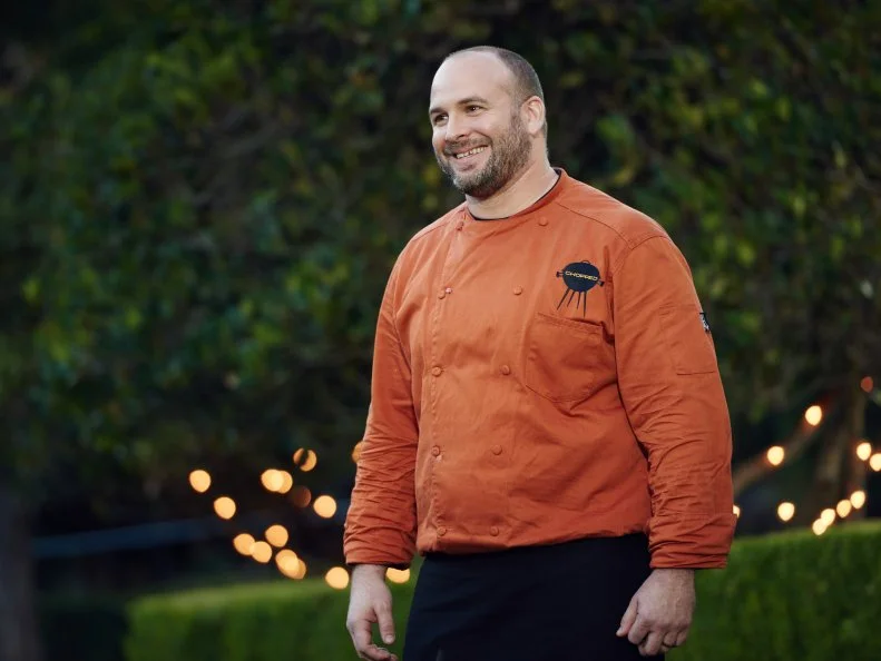 Chef Daniel Gomez Sanchez during Round 3 deliberation, as seen on Food Network's Chopped, Grill Masters Special.