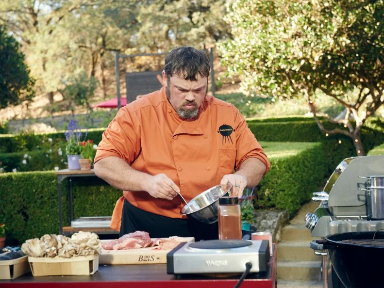 Chef Ken Hess preparing his Round 1 dish, Rose Petal and Chipotle Glazed Tri-tip with Grilled Guacamole and Grilled Tri-tip, as seen on Food Network's Chopped, Grill Masters Special.