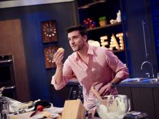 Finalist Damiano Carrara preparing his dish, Vanilla Crème Filled Fritelle with Wild Berry Sauce, for the Mentor Challenge, Food Hacks Snapchat, as seen on Food Network Star, Season 12.