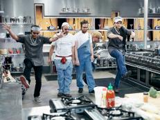 Chef Clayton Carnes, Chef Perry Polkis, and Chef Won Kim show off sabotage tool, Boy Band, as seen on Food Network’s Cutthroat Kitchen, Season 13.