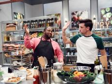 Finalists Jernard Wells and Damiano Carrara preparing their dishes for the Star Challenge, Entertaining with Food Stars, as seen on Food Network Star, Season 12.