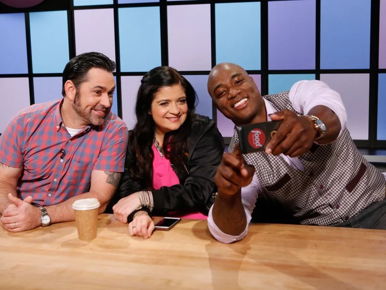 Judges Alex Guarnaschelli, David Guas, and DeMarcus Ware take a selfie, as seen on Food Network's Chopped Junior, Season 4.