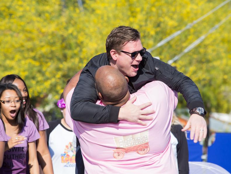 Food truck teams meeting Host Tyler Florence at the funnel cake challenge starting point at Magic Mountain, as seen on Food Network's The Great Food Truck Race, Season 7.