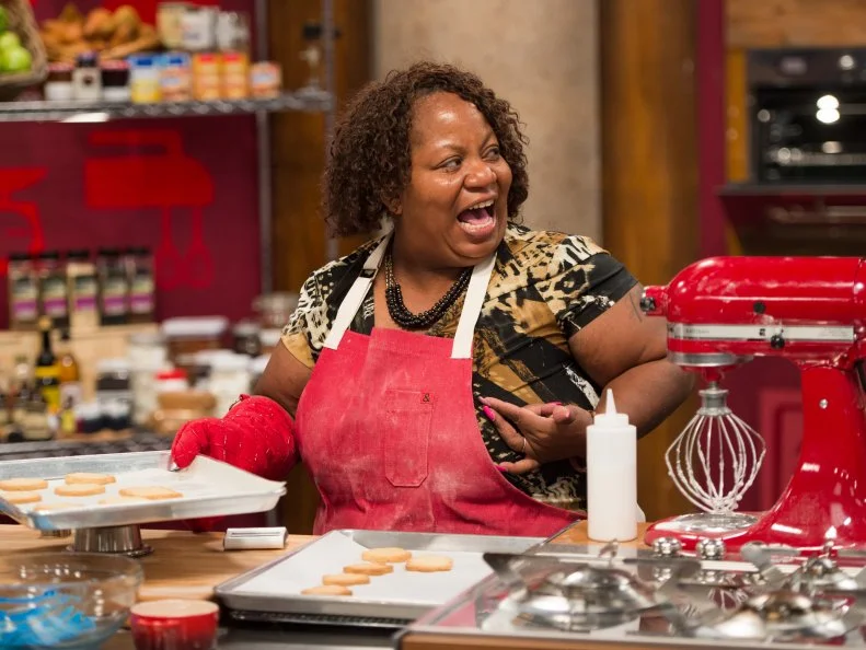 Competitor Carla Johnson races to finish her sugar cookie dish, as seen on Food Network’s Worst Bakers In America, Season 1.