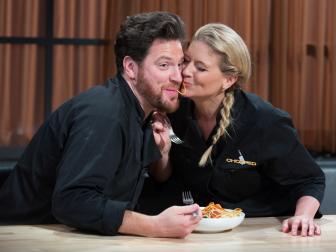 Judges Scott Conant (L) and Amanda Freitag taste Scott Conant's Nididi Rodine during the entrŽe round, Noodles, as seen on Food Network's Chopped After Hours, Season 32.