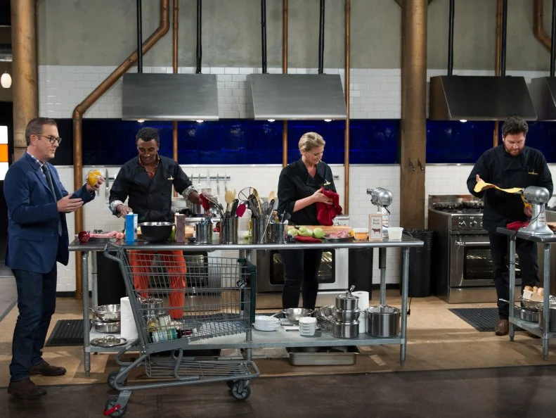 Host Ted Allen (L) with Judges Marcus Samuelson, Amanda Freitag, and Scott Conant cook during the entrŽe round, Noodles, as seen on Food Network's Chopped After Hours, Season 32.