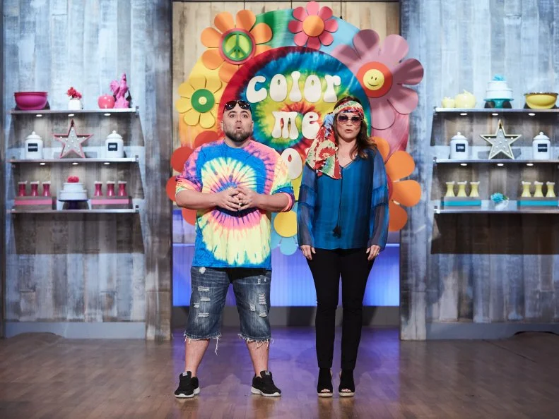 Hosts Duff Goldman and Valerie Bertinelli during the reveal of the Main Heat, as seen on Food Network's Kids Baking Championship, Season 3.