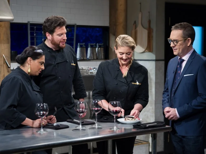 Judges Maneet Chauhan (L), Scott Conant, and Amanda Freitag with Host Ted Allen during the tasting of the dessert round, Chocolate, as seen on Food Network's Chopped After Hours, Season 32.