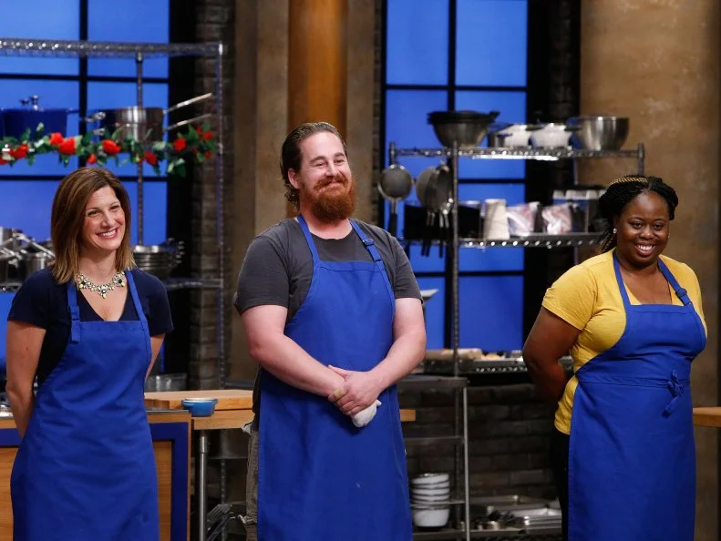 Adam Cooke reacts after being named the blue team winner of the main dish challenge, as seen on Food Network's Worst Cooks in America, Season 10.
