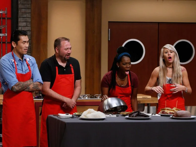 Daniel Mar, Jeff West, Brittany Moore and Mandy Thornton of the red team react to finding out they just ate a dish made with beef tongue, as seen on Food Network's Worst Cooks in America, Season 10.