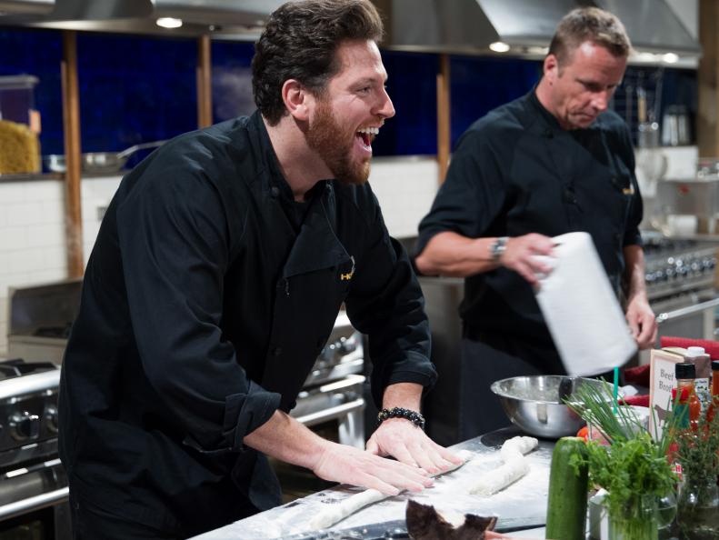 Judges Scott Conant (L) and Marc Murphy cook during the entrŽe round, Whiskey & Wings, as seen on Food Network's Chopped After Hours, Season 32.