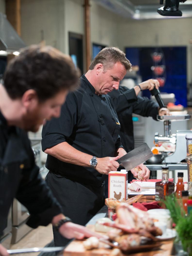 Judges Scott Conant (L) and Marc Murphy cook during the entrŽe round, Whiskey & Wings, as seen on Food Network's Chopped After Hours, Season 32.