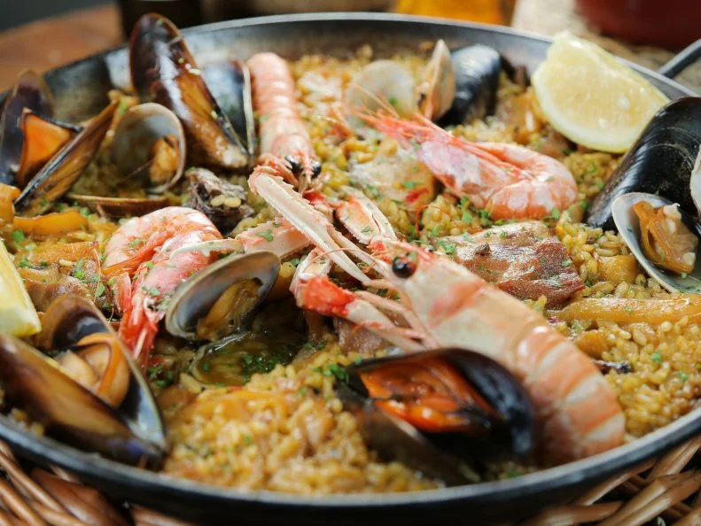 Surf and Turf Paella as served at El Pacifico in Barcelona, Spain as seen on Food Network's Diners, Drive-Ins and Dives episode 2601.