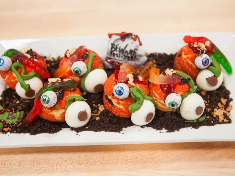 Jasmin Bell's Zombie themed CREAM PUFF AU CRAQUELIN WITH PEANUT BUTTER DIPLOMAT CREAM AND RASPBERRY JAM , as seen on Halloween Baking Championship, Season 3.