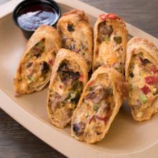 The Bumpkin, egg roll filled with Beef Brisket, Pimento Cheese, Sautéed Onion, Roasted Poblano, Smoked Corn and Chipotle Blackberry BBQ sauce, as seen on Eat Sleep BBQ, Season 1.