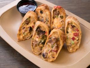 The Bumpkin, egg roll filled with Beef Brisket, Pimento Cheese, Sautéed Onion, Roasted Poblano, Smoked Corn and Chipotle Blackberry BBQ sauce, as seen on Eat Sleep BBQ, Season 1.