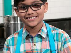 Junior contestant Arjun Ray poses on set, as seen on Food Network's Chopped Junior, Season 6.