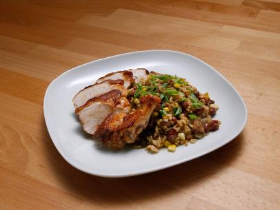 Mentor Anne Burrell's Roast Chicken with Dirty Rice dish is displayed, as seen on Food Network's Worst Cooks in America, Season 10.