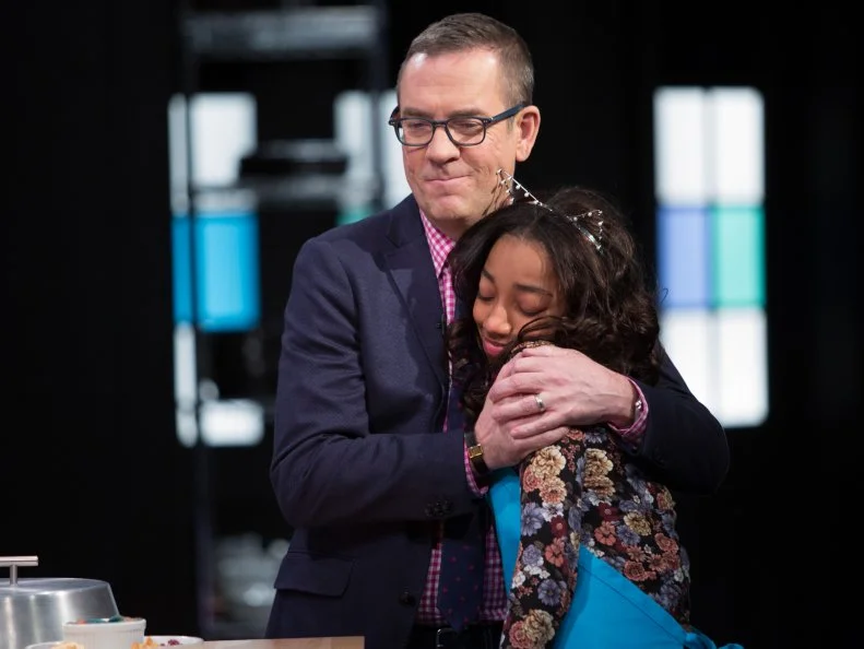Junior contestant Kiara Roy with Host Ted Allen react to Kiara Roy being chopped during the judging of the dessert round, as seen on Food Network's Chopped Junior, Season 6.