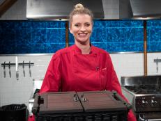Celebrity contestant Hilah Johnson poses on set during the Star Power Tournament, as seen on Food Network's Chopped, Season 33.