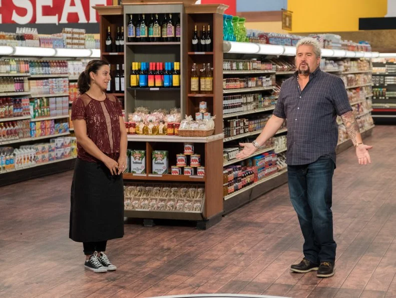 Host Guy Fieri announces that Contestant Tracey Shepos is the winner, as seen on Food Network's Guy's Grocery Games, Season 12.