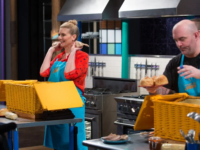 Chef's Amanda Freitag (L), and Chris Santos during the dessert round, as seen on Food Network's Chopped Junior, Season 6.
