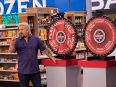 Host Guy Fieri explains how to play the High Low- Food Wheel game, as seen on Food Network's Guy's Grocery Games, Season 12.
