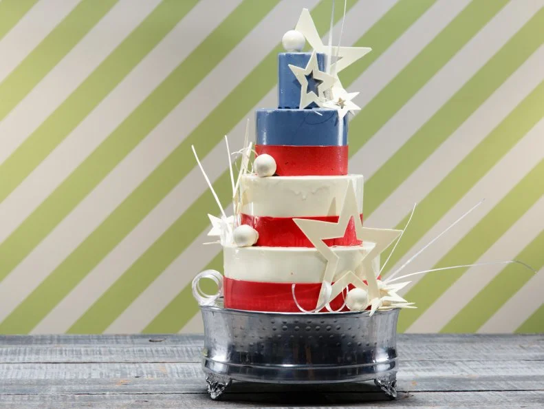 A flags-themed All-American chocolate cake with strawberry ice cream prepared by Adam Young, as seen on Food Network's Spring Baking Championship, Season 3.
