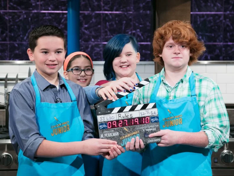 Behind the scenes with Junior contestants Ryan Gonzalez (L), Sophie Remisio, Kenzie Mills, and Jacob Scott during the appetizer round, as seen on Food Network's Chopped Junior, Season 6.