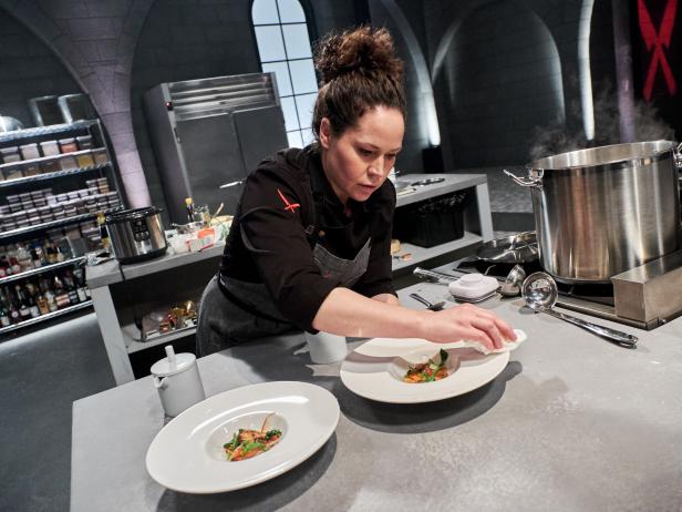 Chef Stephanie Izard prepares her dish, Twice Cooked Pork Belly with Oyster Sauce and Silver Needle Noodles, for the Chairman's Challenge, as seen on Iron Chef Gauntlet, Season 1