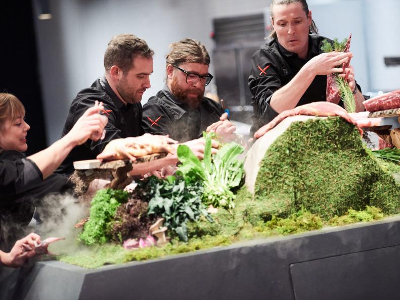 Chefs Sarah Grueneberg, Mike Gulotta, Jason Dady and Jonathon Sawyer grabbing ingredients for the CHariman Challenge, as seen on Iron Chef Gauntlet, Season 1.