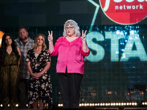 Contestants (left) Suzanne Lossia, Rusty Hamlin and Amy Pottinger (right) behind contestant Nancy Manlove introducing herself for the Mentor Challenge, Ready, Set...Rehearse!, as seen on Food Network Star, Season 13.