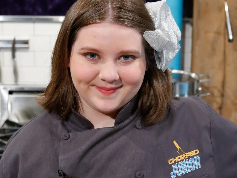 Junior chef Caroline Coleman poses, as seen on Chopped Junior, Season 7.