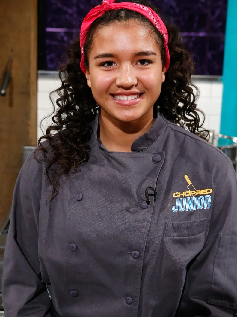 Junior chef Isabella Wylie poses, as seen on Chopped Junior, Season 7.