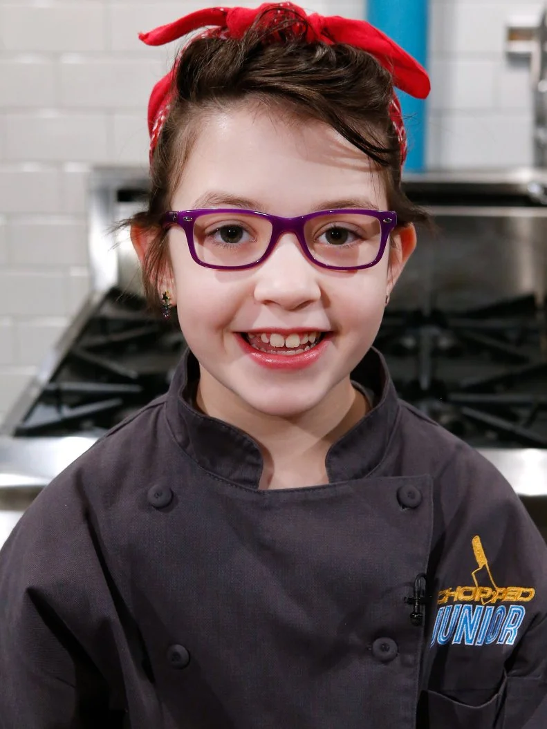 Junior chef Claire Hollingsworth poses, as seen on Chopped Junior, Season 7.