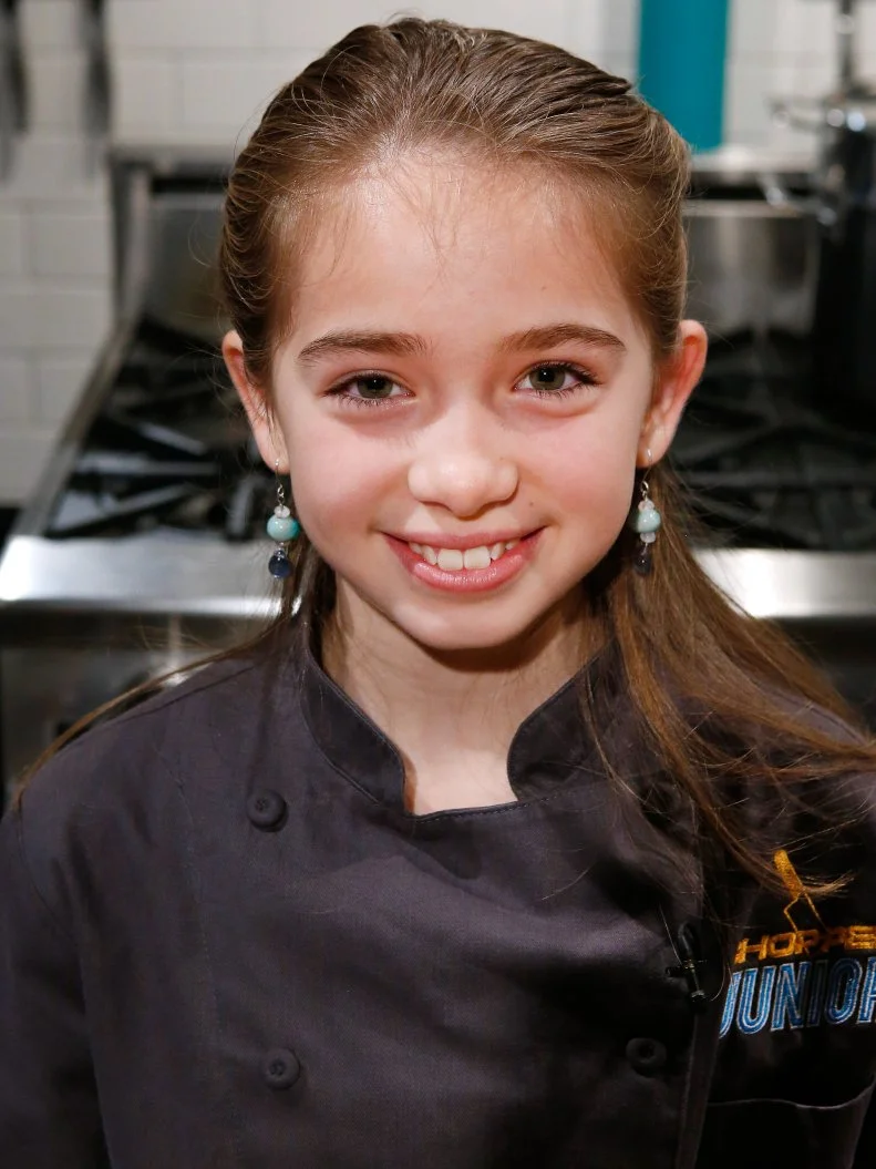 Junior chef Mischa Waydo poses, as seen on Chopped Junior, Season 7.