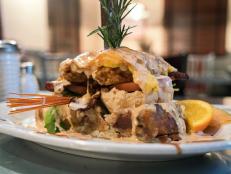 <p>Leave the buffet behind in favor of hearty comfort food from Hash House A Go Go. Jeff and Audrey Dunham stopped in for the Red Velvet Pancakes and the legendary Fried Chicken Benedict. "This is the most insane breakfast we have ever had,&rdquo; Jeff said of the mountainous benedict.</p>
<p class="MsoNormal">&nbsp;</p>