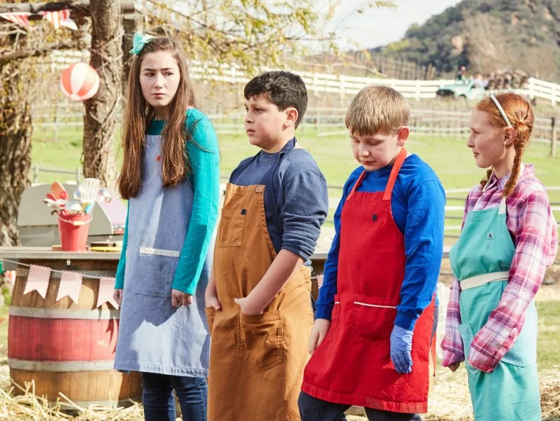 Contestants Kelsey Deleshaw, Daniel Marcus, Gill Corbett and Raegan Frash during elimination, as seen on Kids BBQ Championship, Season 2.