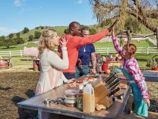 Hosts Damaris Phillips and Eddie Jackson with guest judge Shannon Ambrosio judging Contestant Raegan Frash's Round 1 dish, Hawaiian Sausage with Pineapple and Peppers, as seen on Kids BBQ Championship, Season 2.