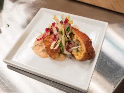 Contestant Rusty Hamlin's dish, Creole Corn and Crab Hand Pies with Endive Slaw and Come Back Sauce, for the Star Challenge Betcha Didn't Know, as seen on Food Network Star, Season 13.