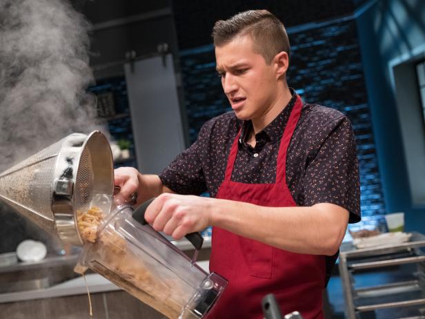 Contestant Matthew Grunwald prepares his dish, Cast Iron Roasted Lamb Loin w/ Cumin Carrots & Salsa Verde, for the Star Challenge Experiential Restaurant, as seen on Food Network Star, Season 13.