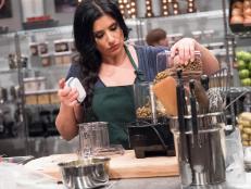 Contestant Suzanne Lossia prepares her dish Middle Eastern Baklava for the Star Challenge Experiential Restaurant, as seen on Food Network Star, Season 13.