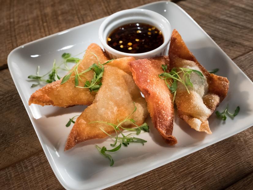 Guest Judge Alex Guarnaschelli's resulting version of Matthew Grunwald's dish, Lamb Ginger Pot Stickers with a Ponzu Dipping Sauce, for the Star Challenge Cooking Goes Live, as seen on Food Network Star, Season 13.