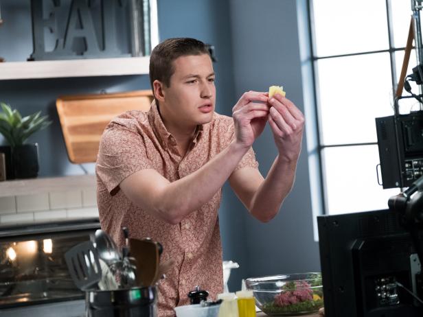 Contestant Matthew Grunwald live streaming a demo of his dish, Lamb Ginger Pot Stickers with a Ponzu Dipping Sauce, for the Star Challenge Cooking Goes Live, as seen on Food Network Star, Season 13.