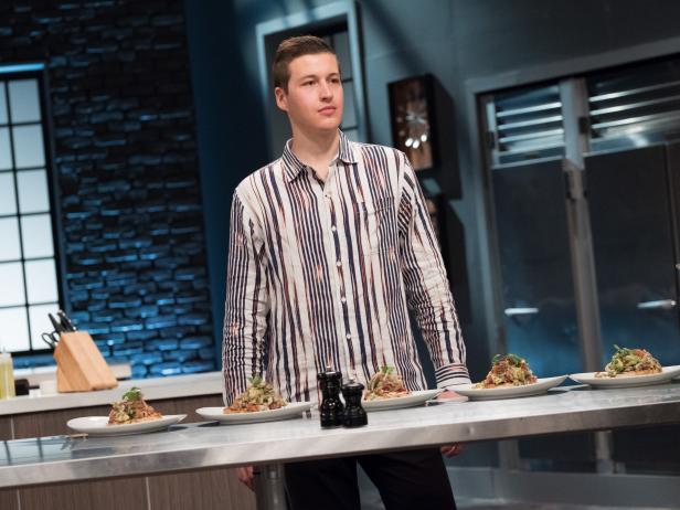 Contestant Matthew Grunwald finished plating his dish, Blackened Swordfish with Tomatillo Salsa, for the Star Challenge Cook For Your Life, as seen on Food Network Star, Season 13.